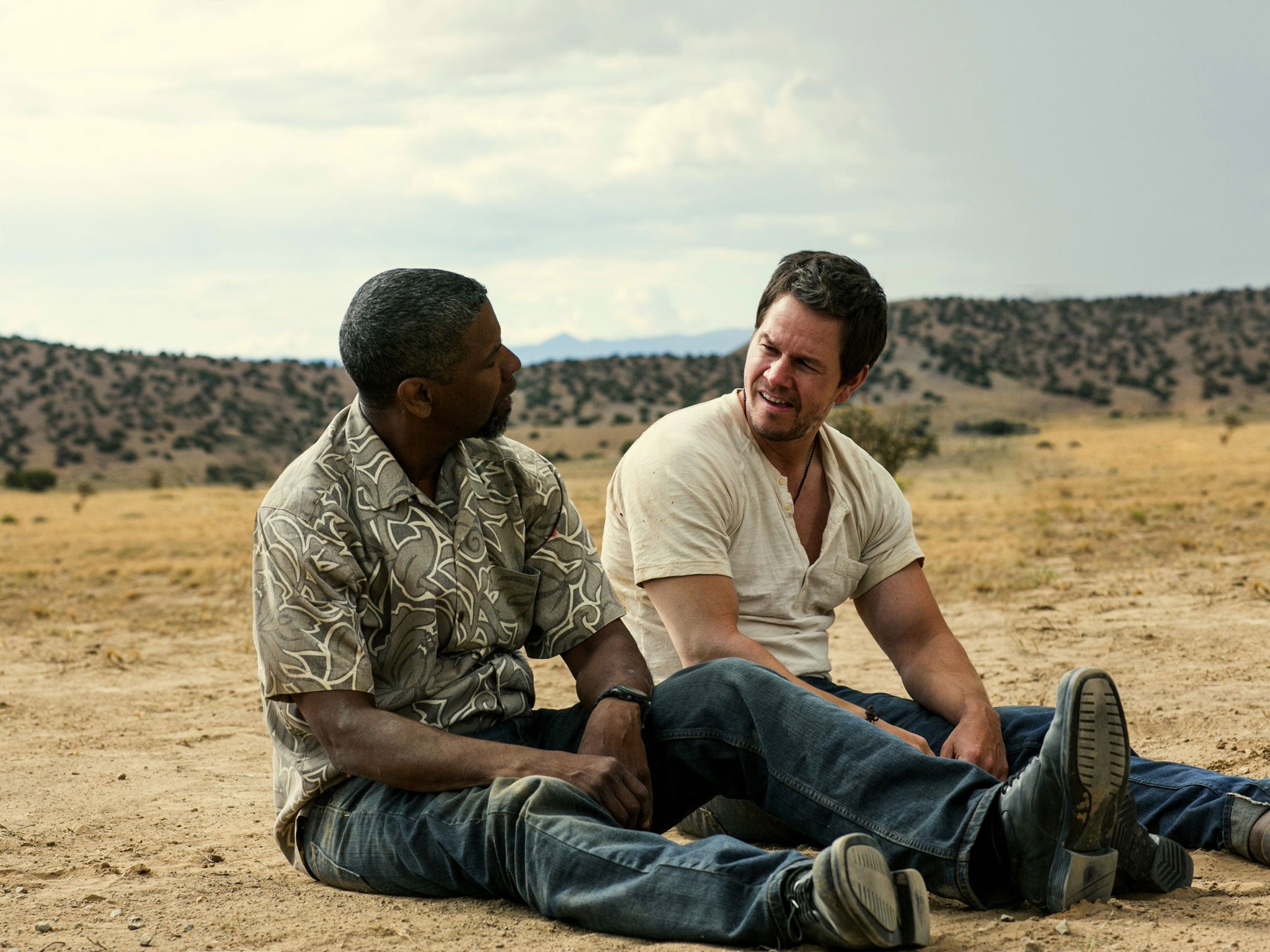Out of gas: Denzel Washington and Mark Wahlberg fail to load up on
laughs in '2 Guns'