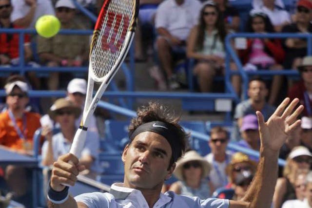 Roger Federer recovered from a slow start to beat Tommy Haas