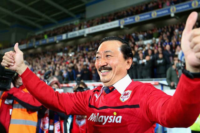 Cardiff City owner Vincent Tan celebrates his team’s promotion to the Premier League