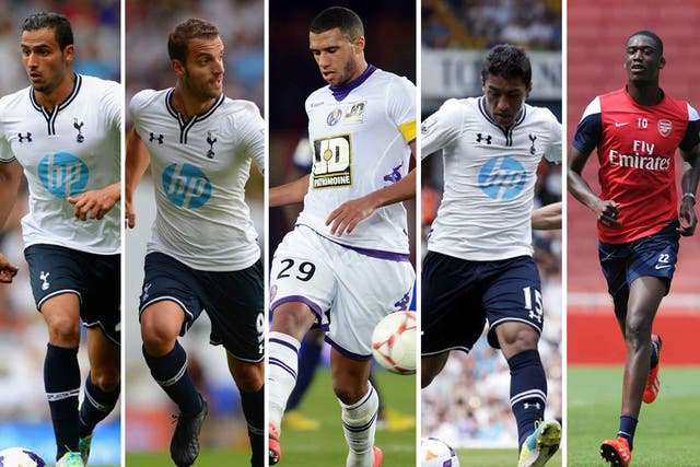 Spurs signings from left, Nacer Chadli, Roberto Soldado, Etienne Capoue, Paulinho. Arsenal's sole signing this summer has been Yaya Sanogo, far right