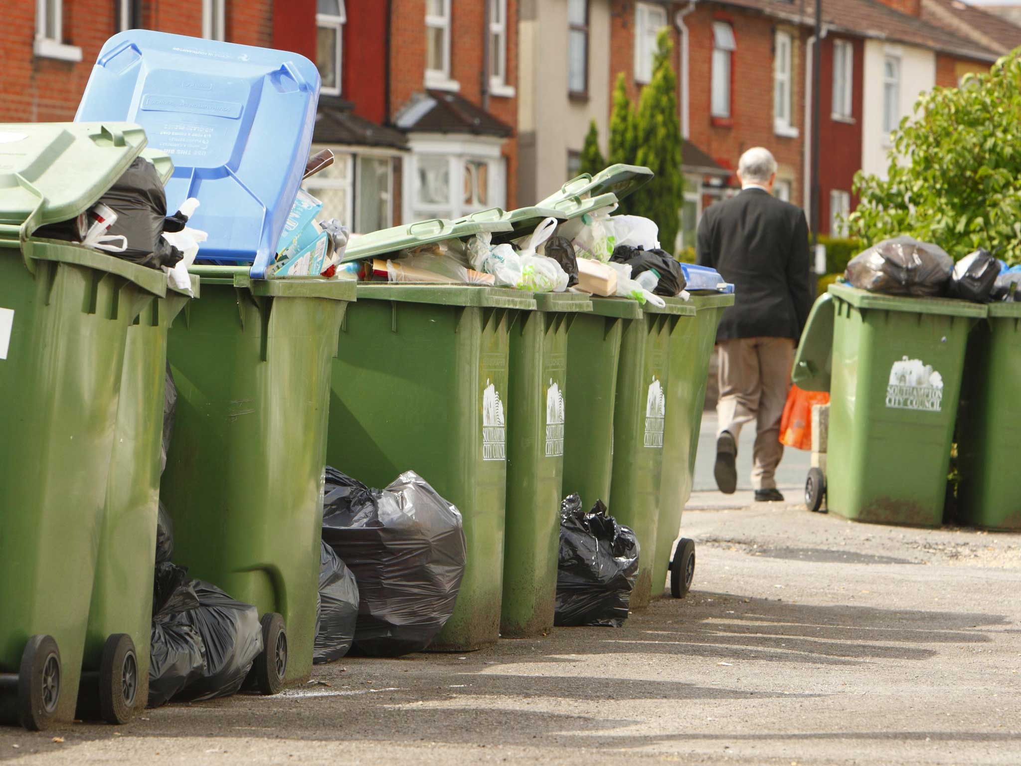 New homes should be built with storage areas for wheelie bins, says Eric Pickles