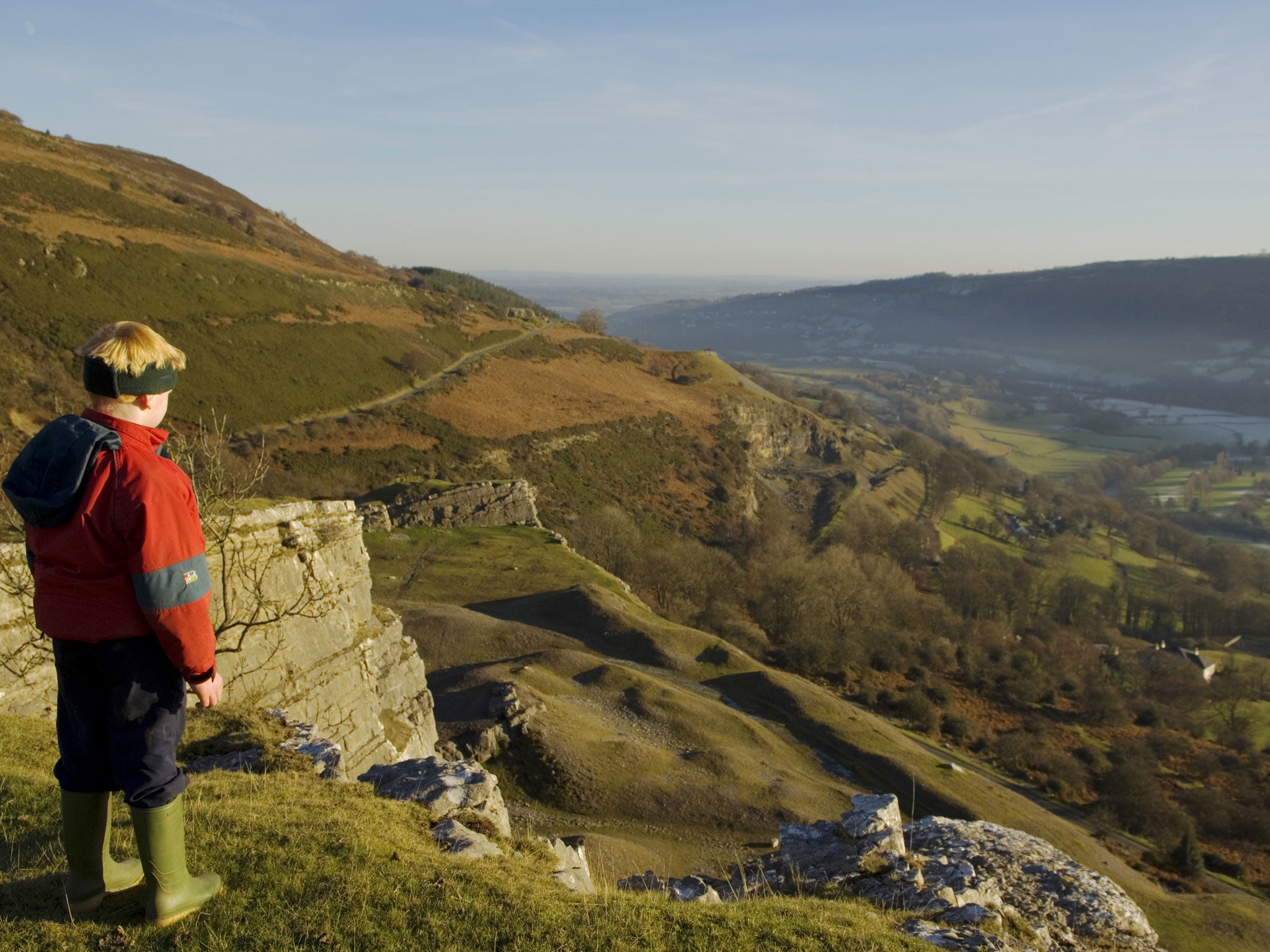 A boy overlooks the Vale of Llangollen near to where the section of Offa's Dyke has allegedly been flattened