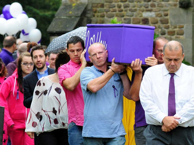 Hannah Smith's father David  Smith (centre) carries her coffin following the teenager's funeral service