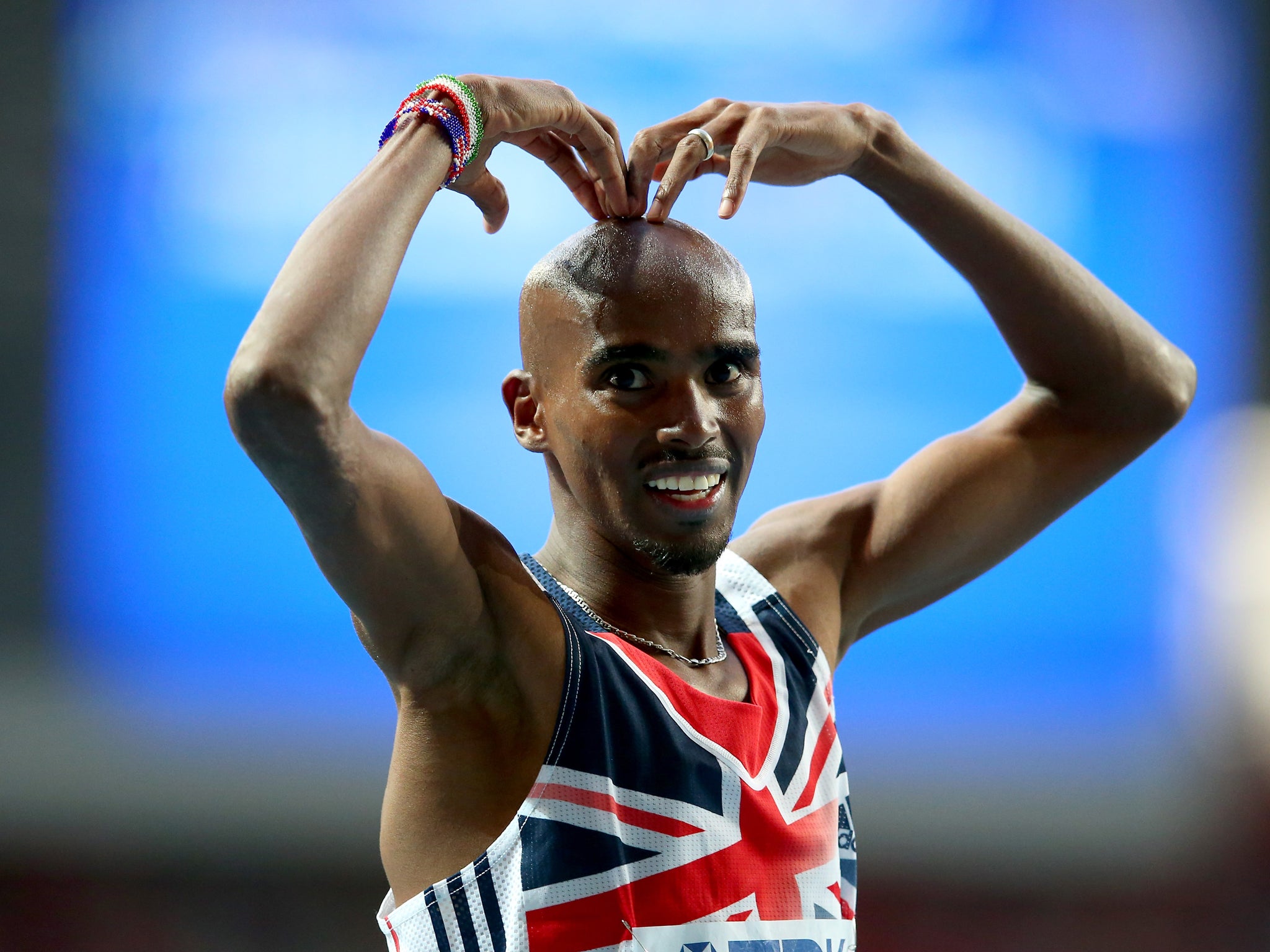 Mo Farah celebrates after winning Gold in the 5,000m