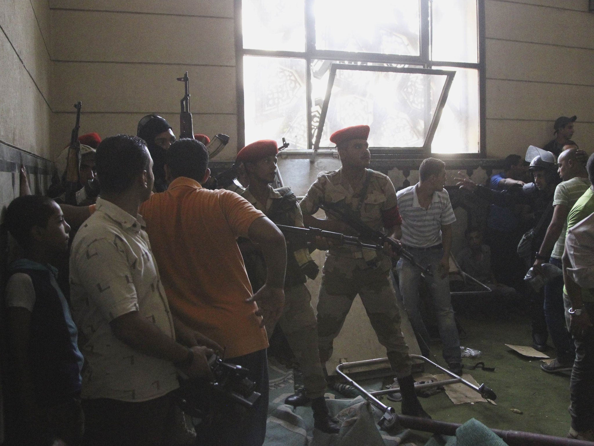 Army inside a room of al-Fath mosque when supporters of deposed Egyptian President Mohamed Mursi exchanged gunfire with security forces inside the mosque in Cairo on 17 August