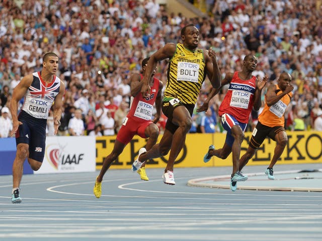 Usain Bolt, centre, leads the field, including Adam Gemili, left, in his 200m victory in Moscow