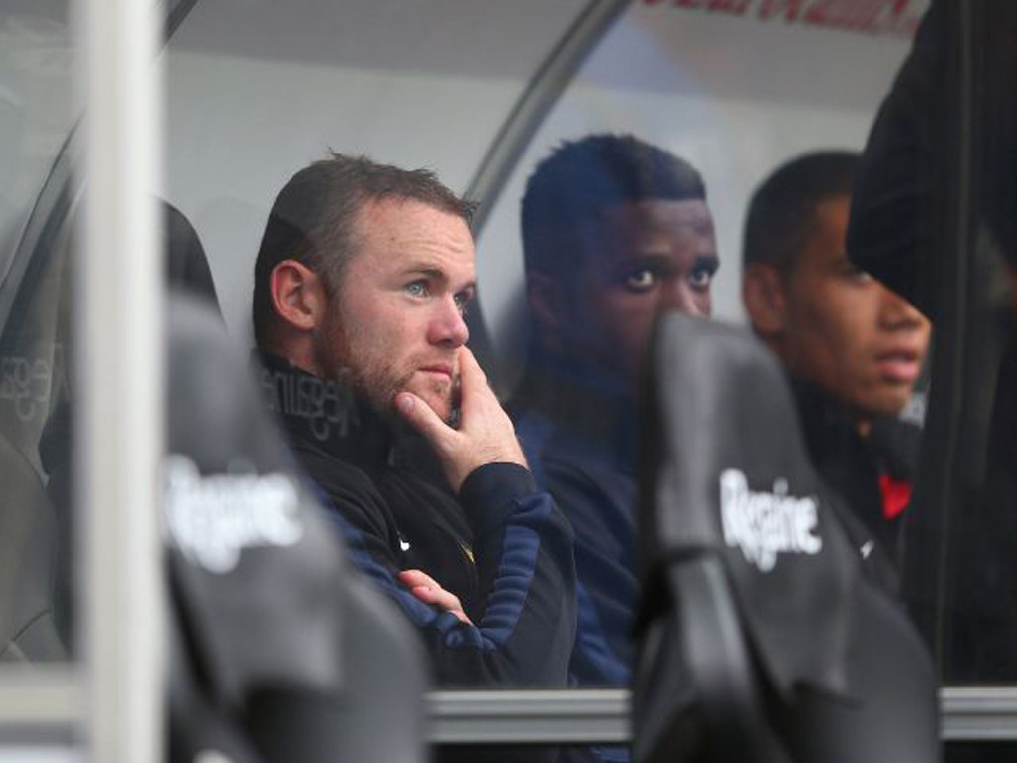 Wayne Rooney came off the bench to assist Manchester United's third and four goals - although his body language did not suggest contentment (Michael Steele/Getty Images)