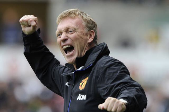Moyes celebrates one of Manchester United goals during his first league game in charge of the club (Rebecca Naden/Reuters)