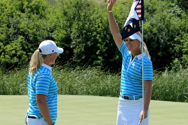That’s ace: Anna Nordqvist, right, celebrates her hole-in-one with Caroline Hedwall, left