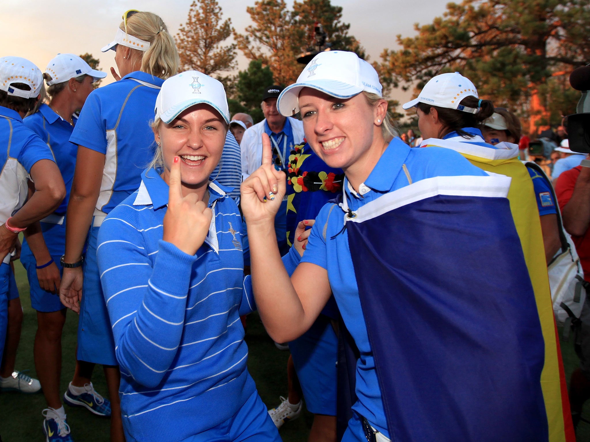 Charley Hull (left) and Jodi Ewart- Shadoff of England and The European Team celebrate victory in 2013