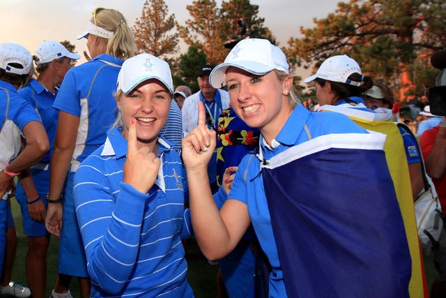 Charley Hull (left) and Jodi Ewart- Shadoff of England and The European Team celebrate