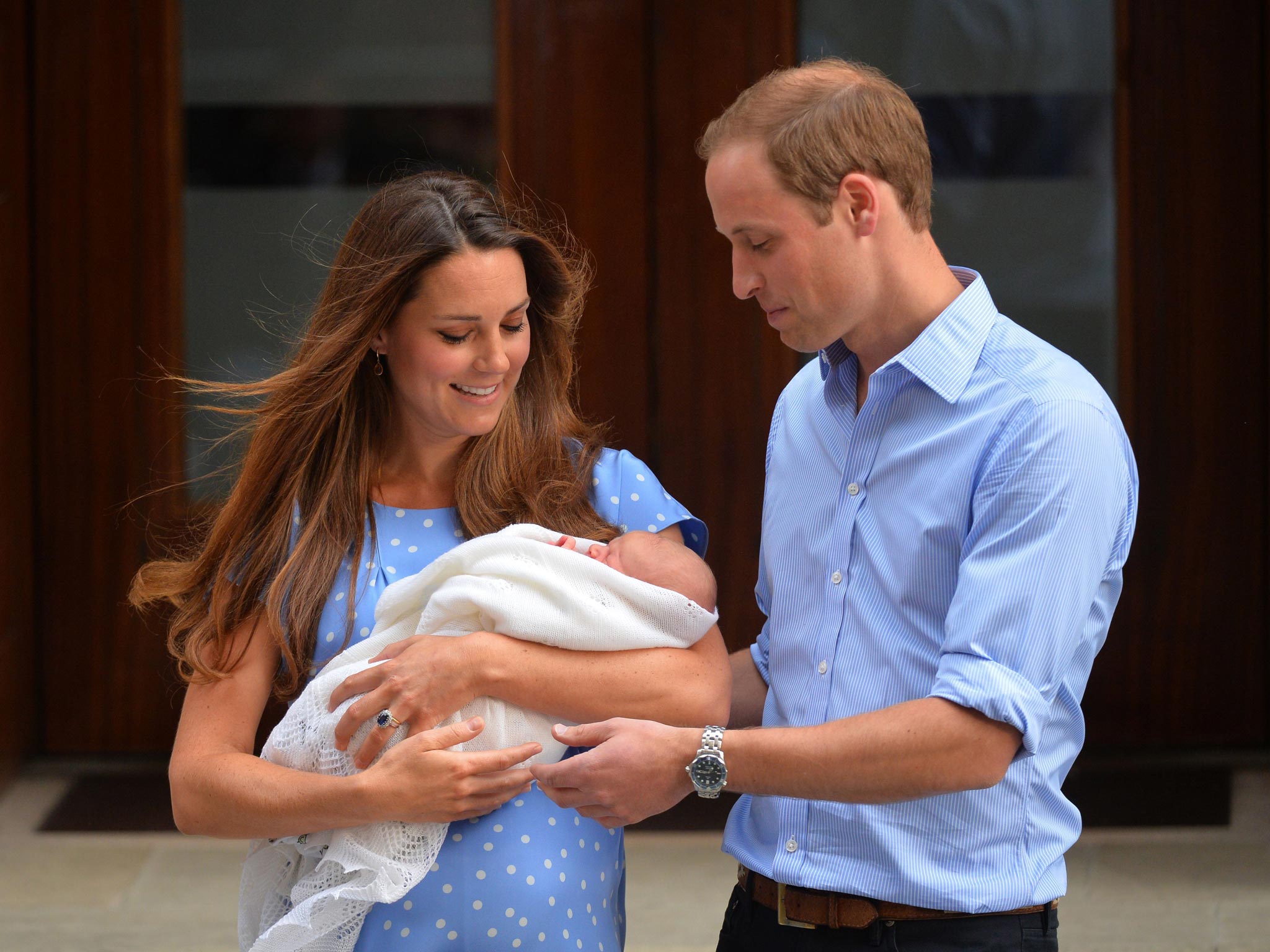 Prince William, Duke of Cambridge, and Catherine, Duchess of Cambridge show their new-born baby boy, Prince George of Cambridge