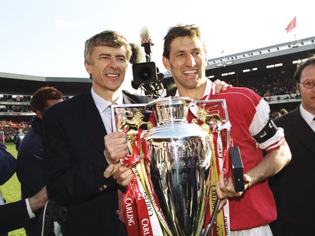 Arsene Wenger and Tony Adams with the Premier League trophy in 1998