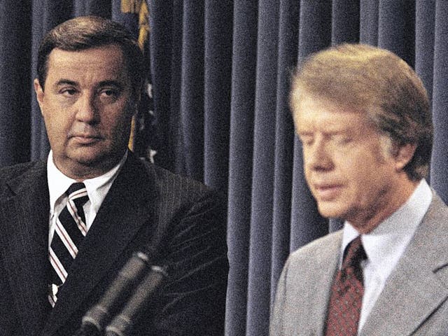Lance, left, with Jimmy Carter in 1977; he was soon out of a job