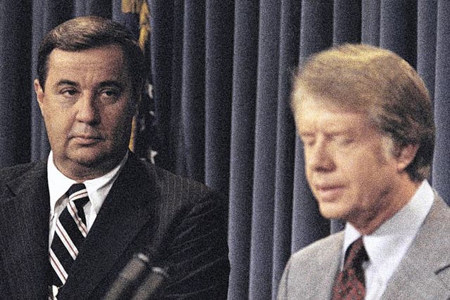 Lance, left, with Jimmy Carter in 1977; he was soon out of a job