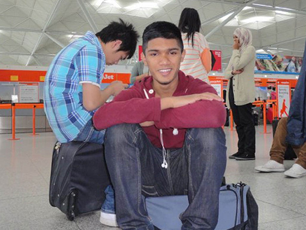 Ajmol Alom, pictured here at belfast Airport during a school trip to Northern Ireland, was killed in a knife attack