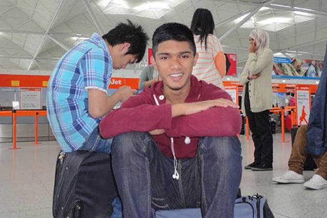 Ajmol Alom, pictured here at belfast Airport during a school trip to Northern Ireland, was killed in a knife attack 