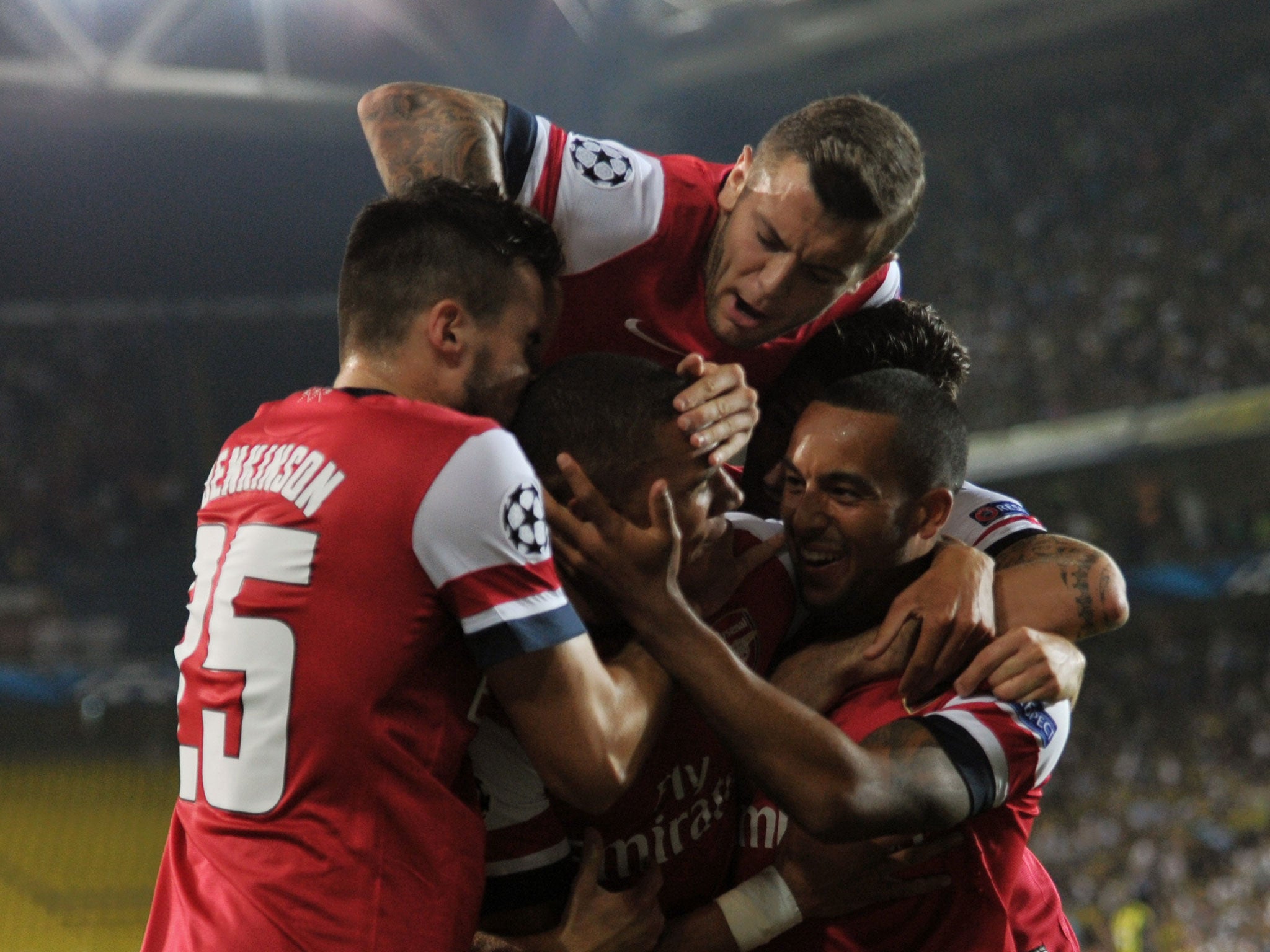 Kieran Gibbs is mobbed by ecstatic team-mates after putting Arsenal 1-0 against Fenerbahce