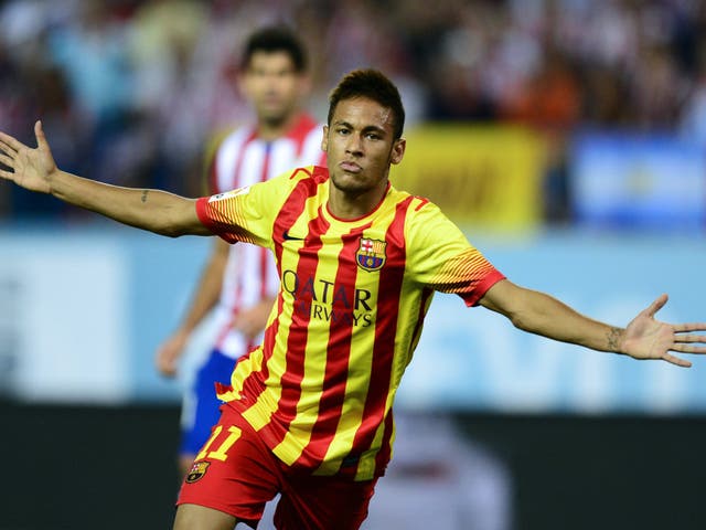 Neymar celebrates his first goal for Barcelona