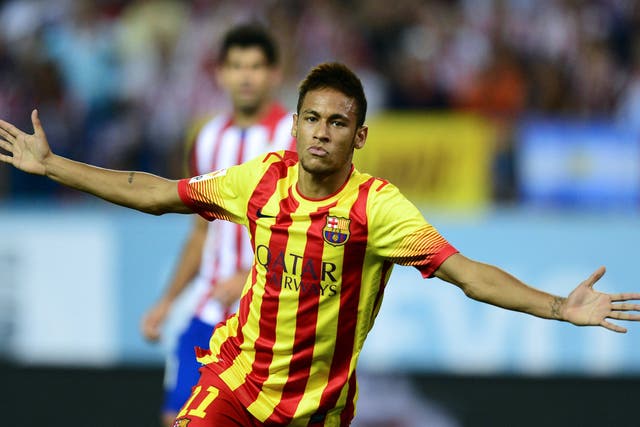 Neymar celebrates his first goal for Barcelona