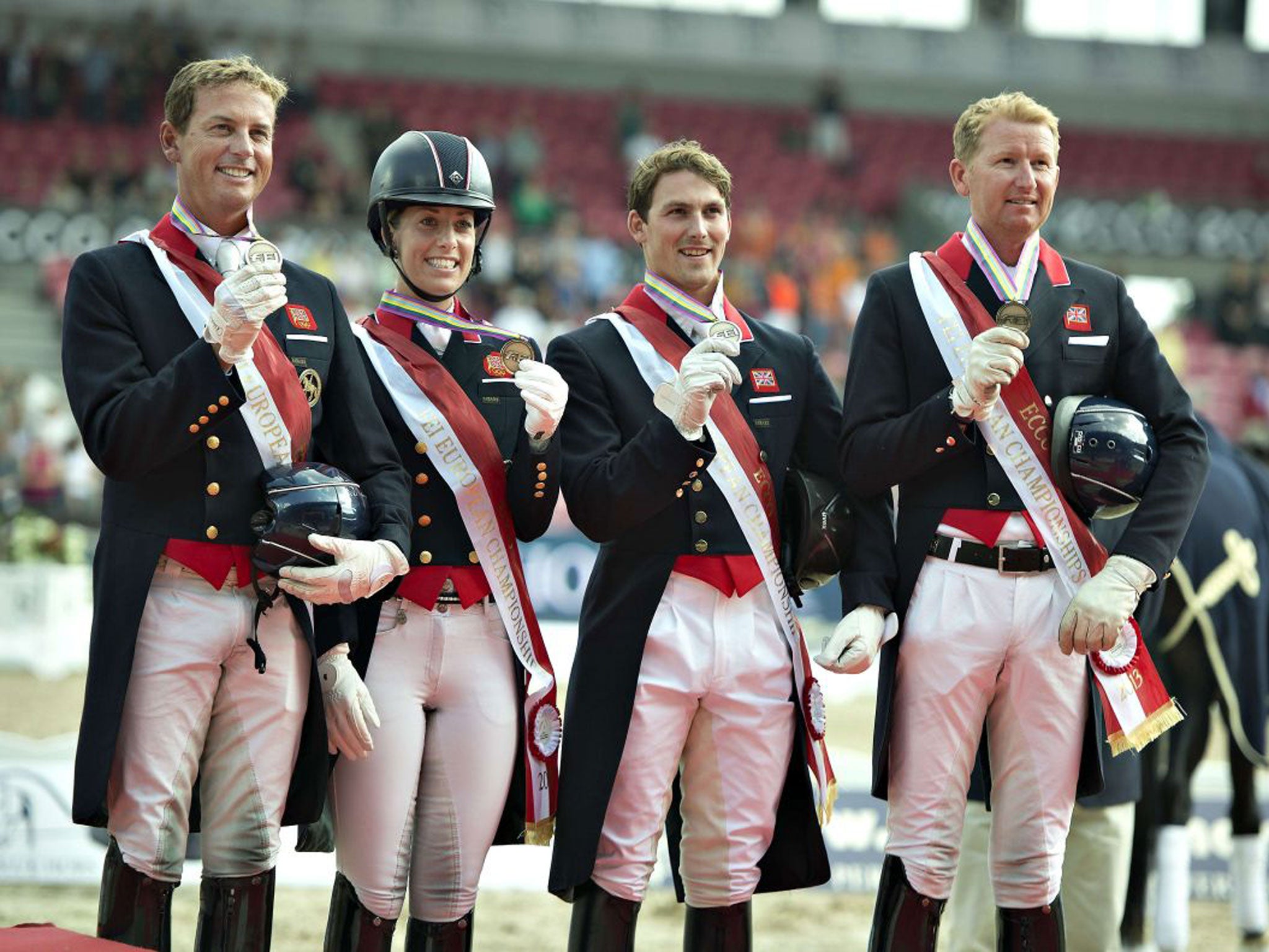 Dujardin, second from left, broke her own world best of 84.447 per cent