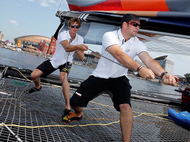 Heave ho me hearties! Chris Grube (left) and Tudur Owen put their backs into racing Team Wales as the local team, supported at each regatta in the Extreme Sailing Series by sponsor Land Rover, joins the fray in Cardiff Bay