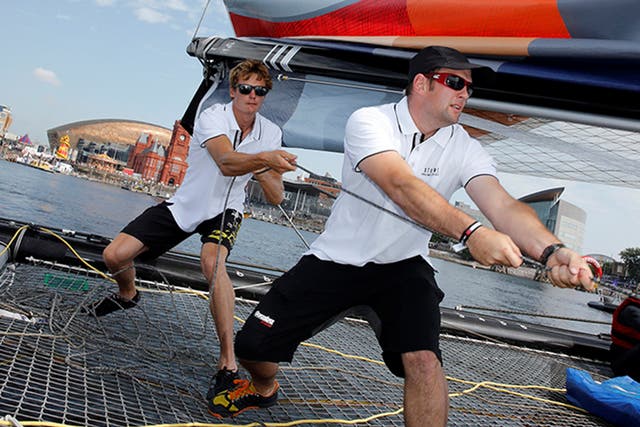Heave ho me hearties! Chris Grube (left) and Tudur Owen put their backs into racing Team Wales as the local team, supported at each regatta in the Extreme Sailing Series by sponsor Land Rover, joins the fray in Cardiff Bay