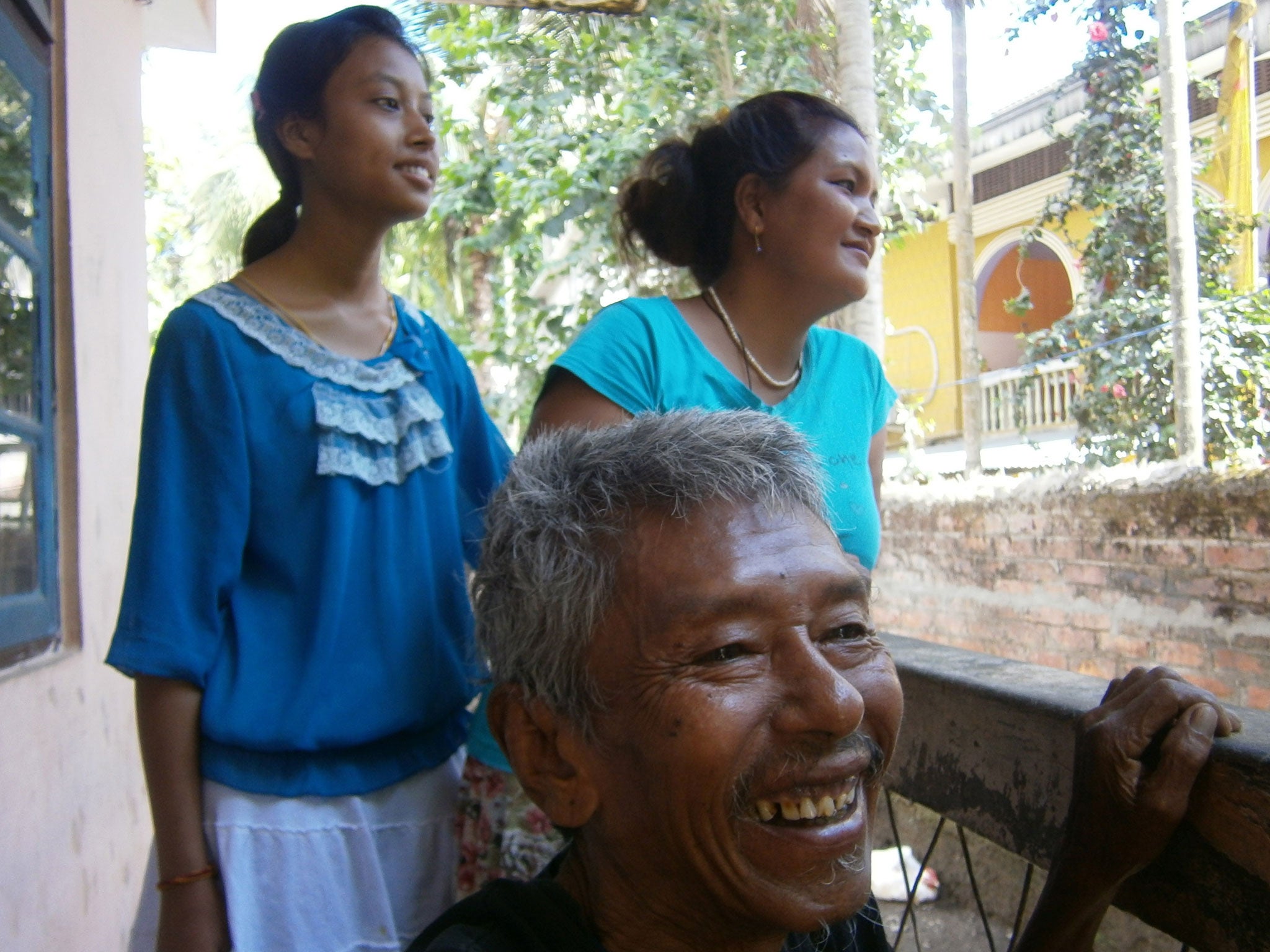 Thak Majhi with a daughter Deomaya, right, and granddaughter Rejina