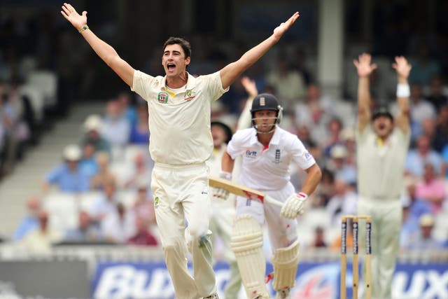 Mitchell Starc appeals successfully for the wicket of Jonathan Trott