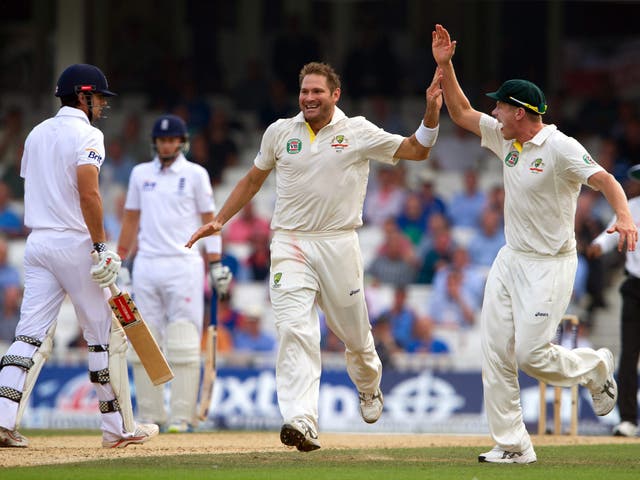 Ryan Harris celebrates after taking the wicket of England's captain, Alastair Cook, at The Kia Oval