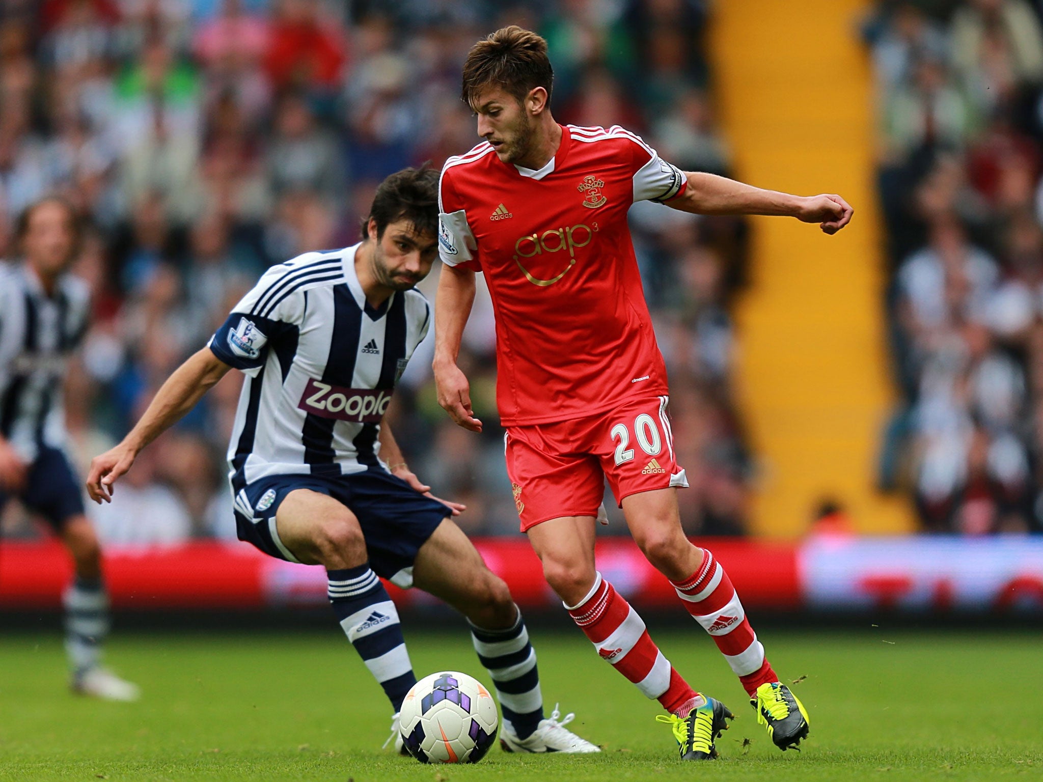 Adam Lallana, right in action during Southampton's opening day Premier League victory at West Bromwich Albion