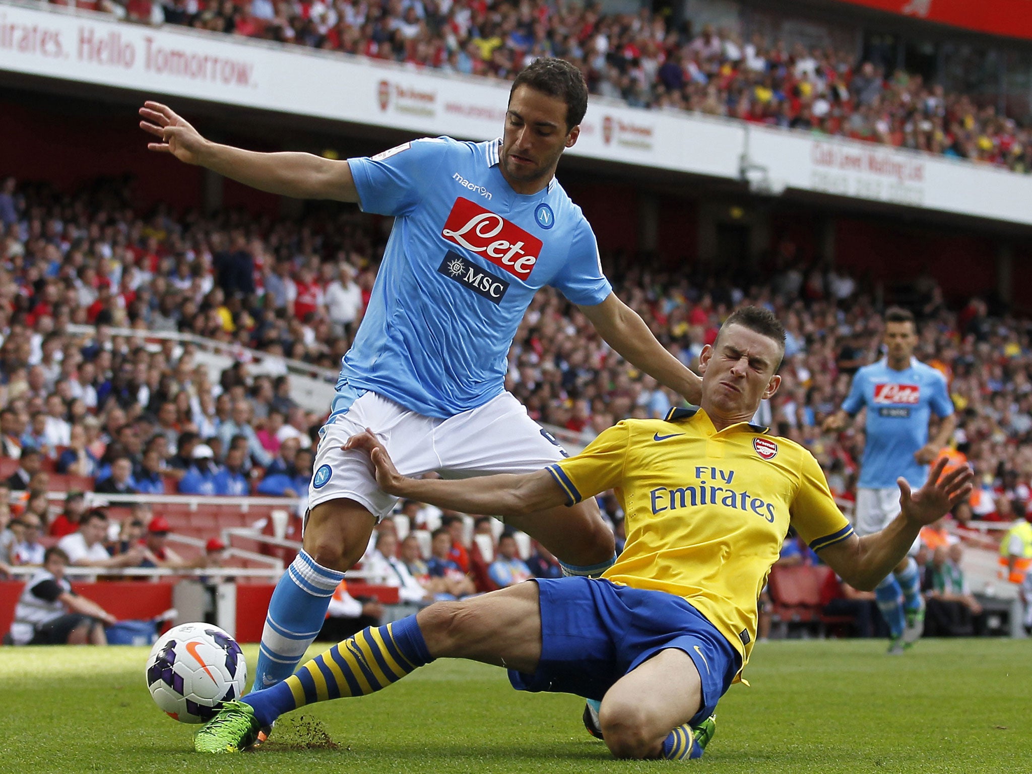 Gonzalo Higuain, in action for Napoli against Arsenal, is one of Italy's few imports