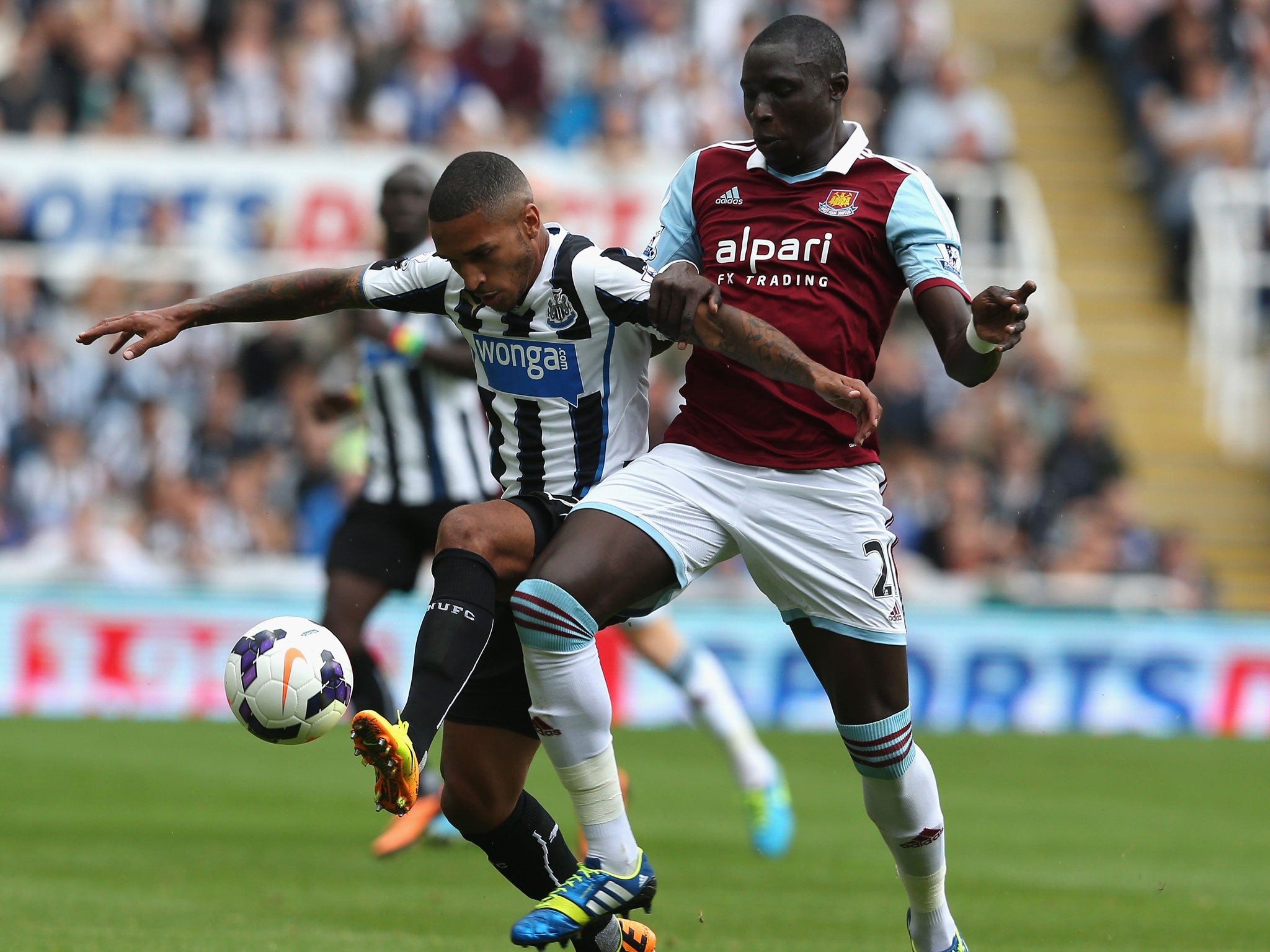 Sylvain Marveaux of Newcastle is challenged by West Ham's Mohamed Diame