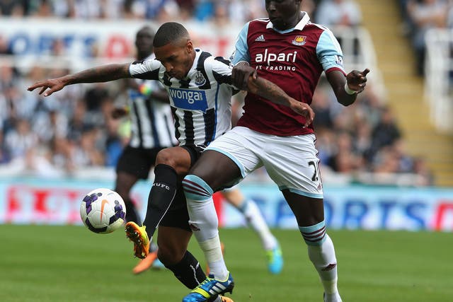 Sylvain Marveaux of Newcastle is challenged by West Ham's Mohamed Diame