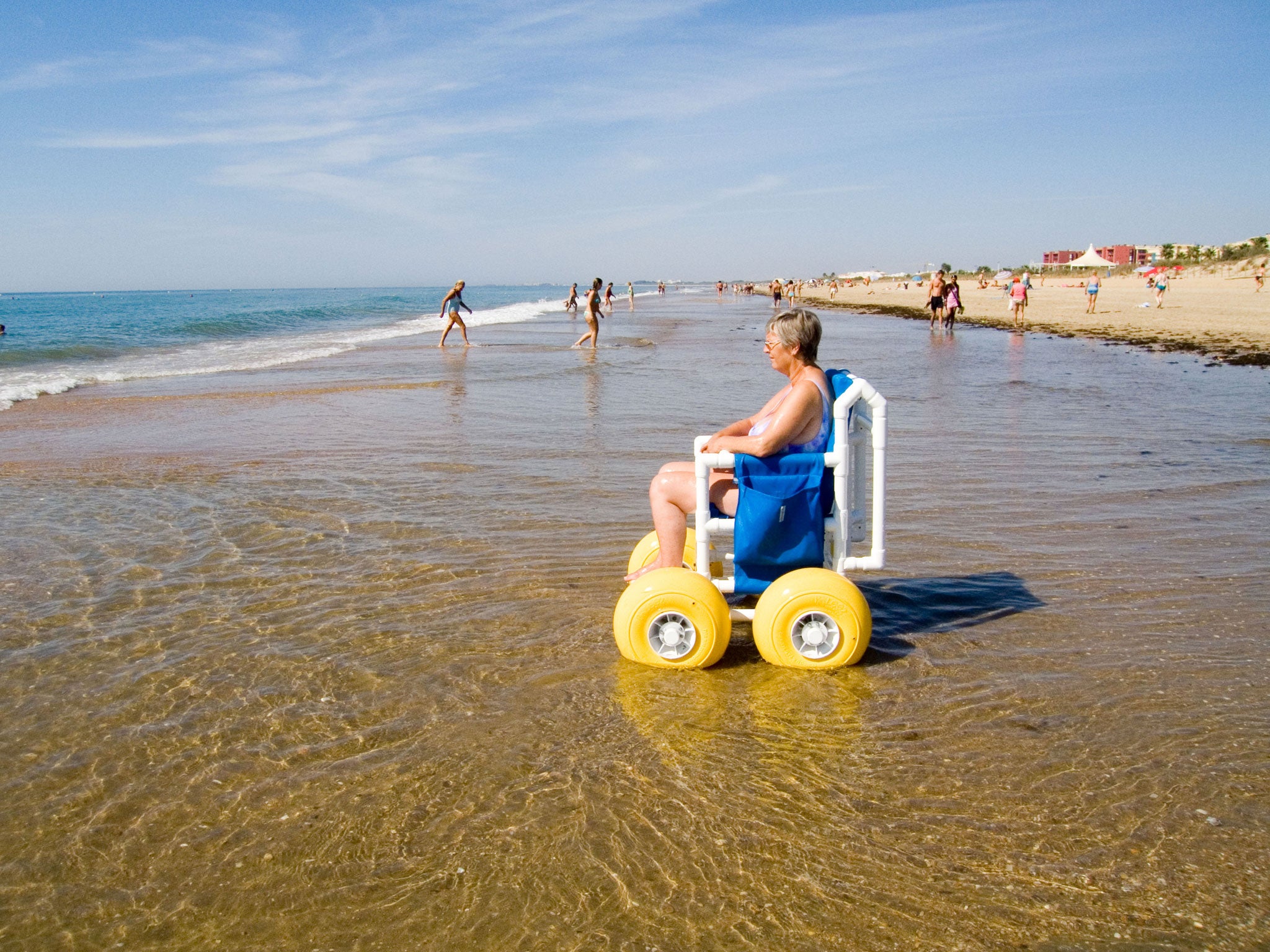 Sea life: with a beach wheelchair, a disabled visitor can go on the sand and take to the water
