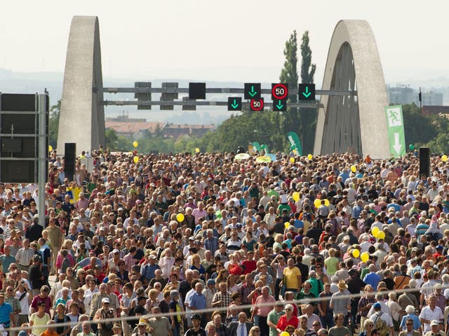 Crowds congregate on the 'ugly' bridge