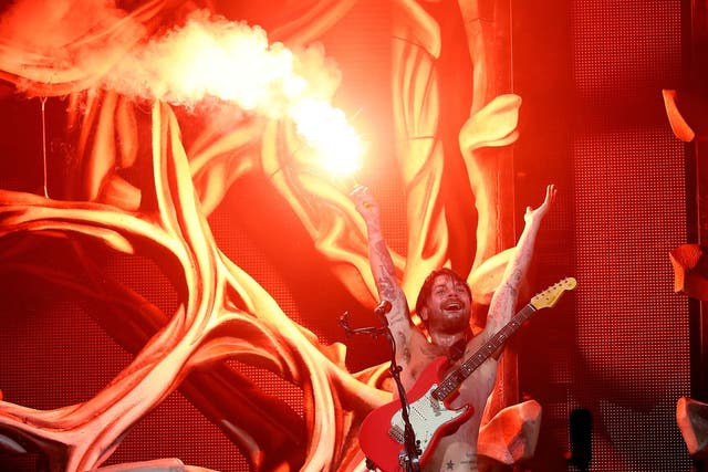 Simon Neil of Biffy Clyro performing on the main stage, during day three of the Reading Festival