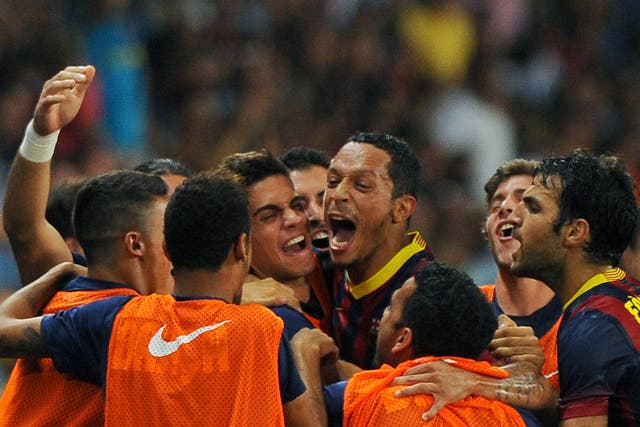 Barcelona celebrate Adriano's goal