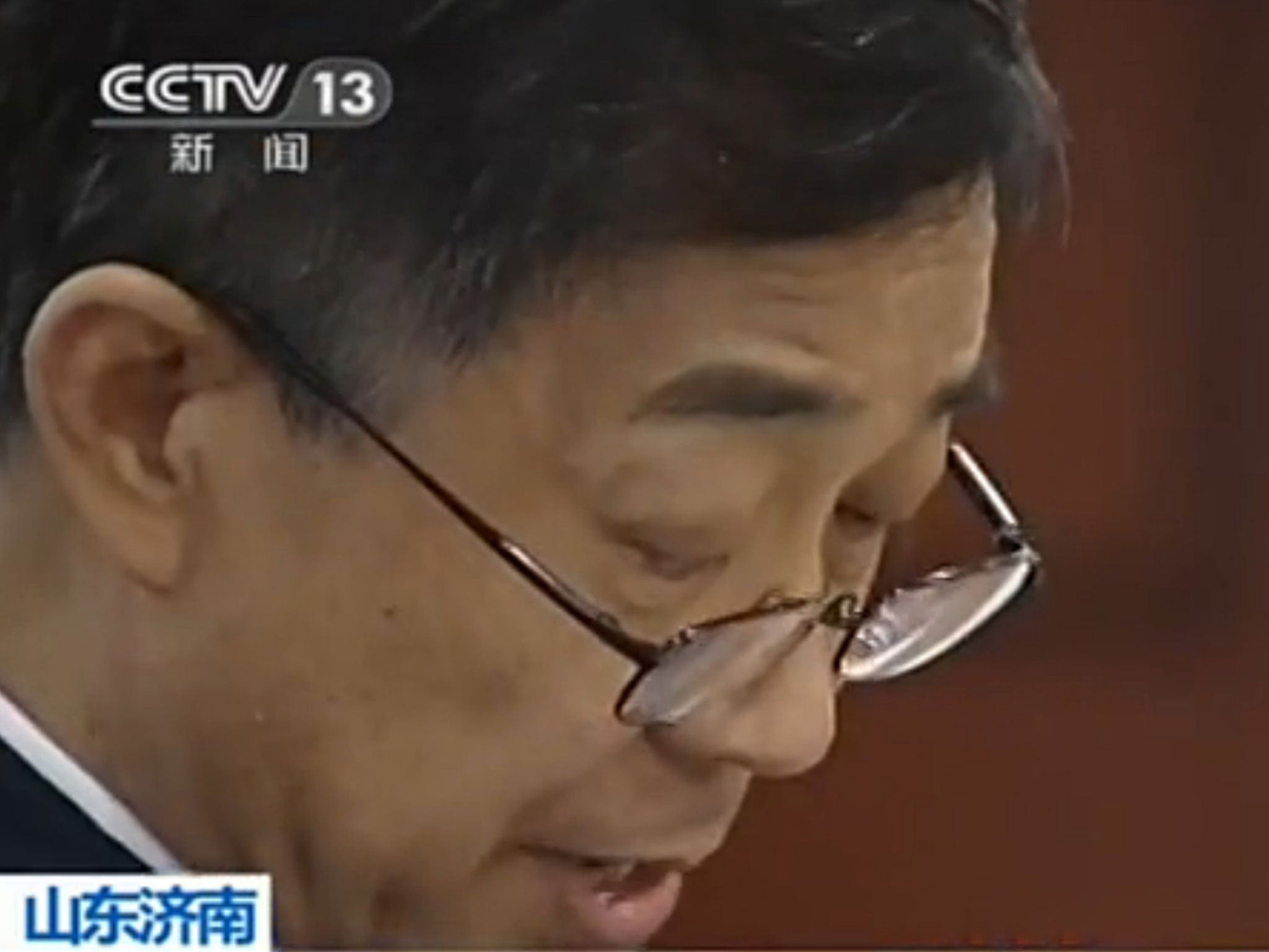 Bo Xilai reads his closing remarks on the final day of his trial, in this screengrab from Chinese television