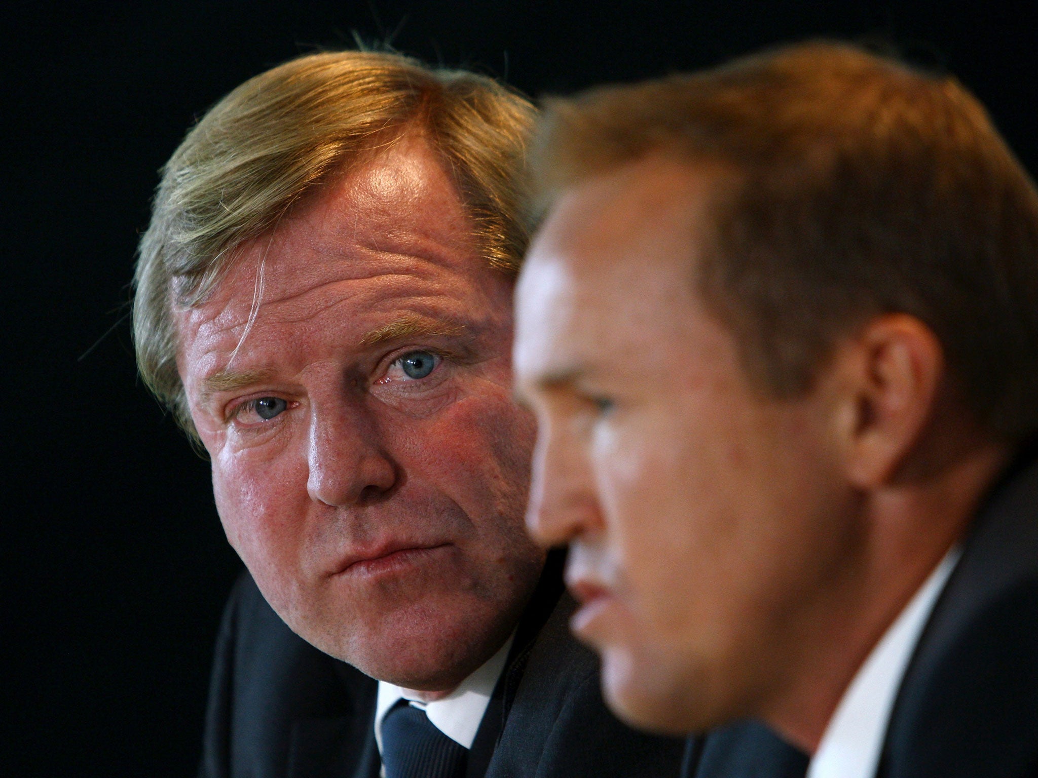 Hugh Morris (left) looks on as Andy Flower speaks to the media after being installed as the full-time England head coach in 2009