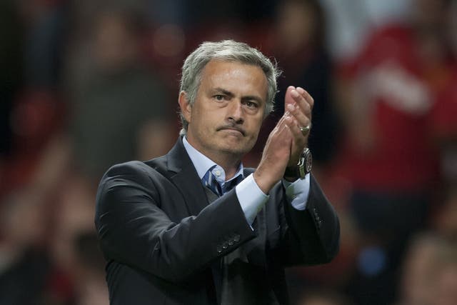 Jose Mourinho applauds the Chelsea supporters 