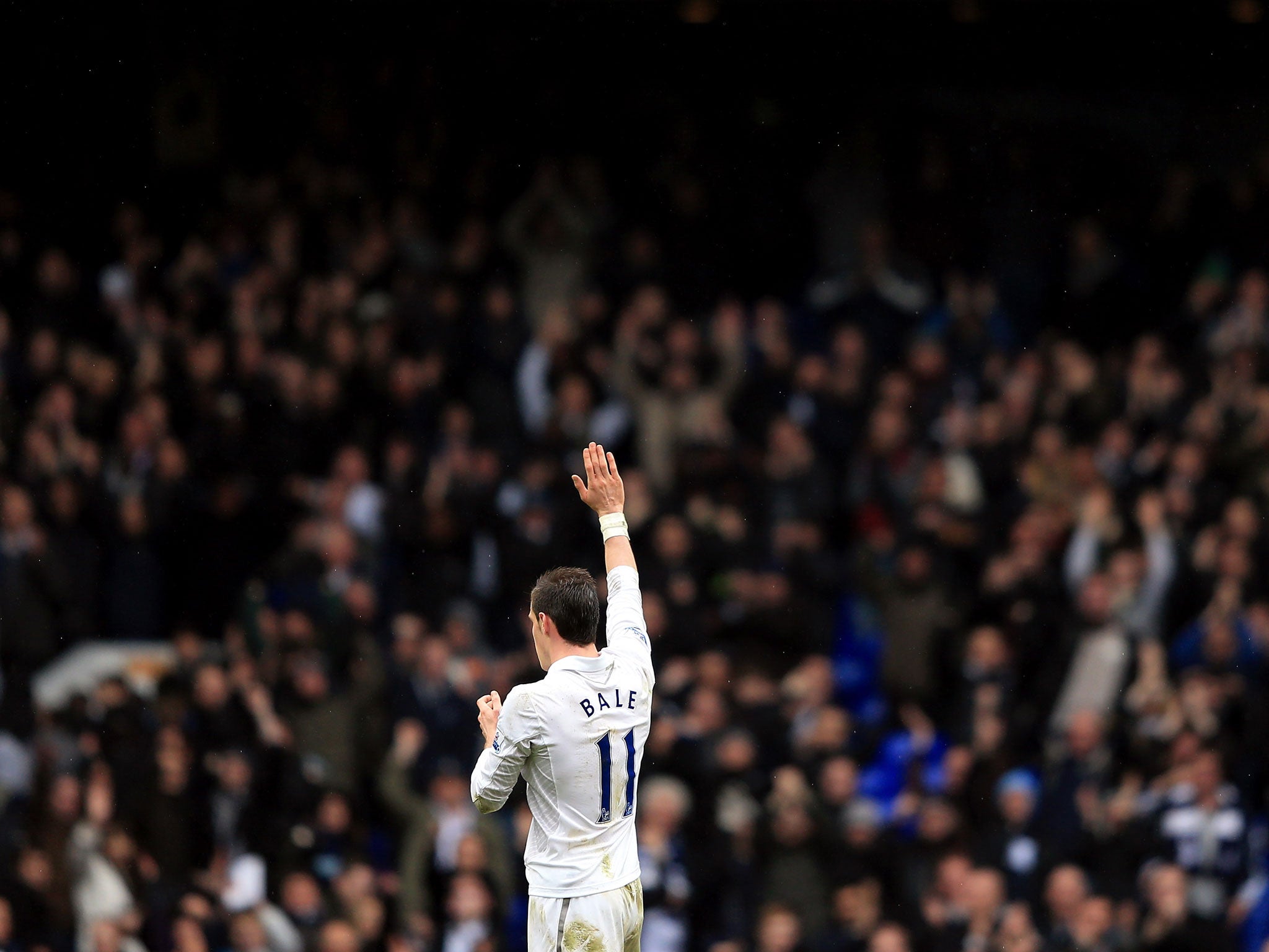 LONDON, ENGLAND - FEBRUARY 2013: Gareth Bale of Tottenham applaudes the fans at the final whistle during the Barclay's Premier League match between Tottenham Hotspur and Newcastle United at White Hart Lane. GETTY IMAGES