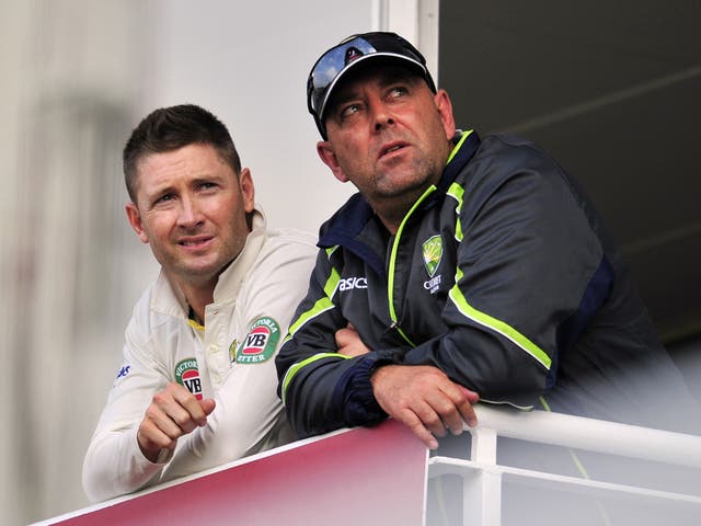 Australia captain Michael Clarke (L) and coach Darren Lehmann