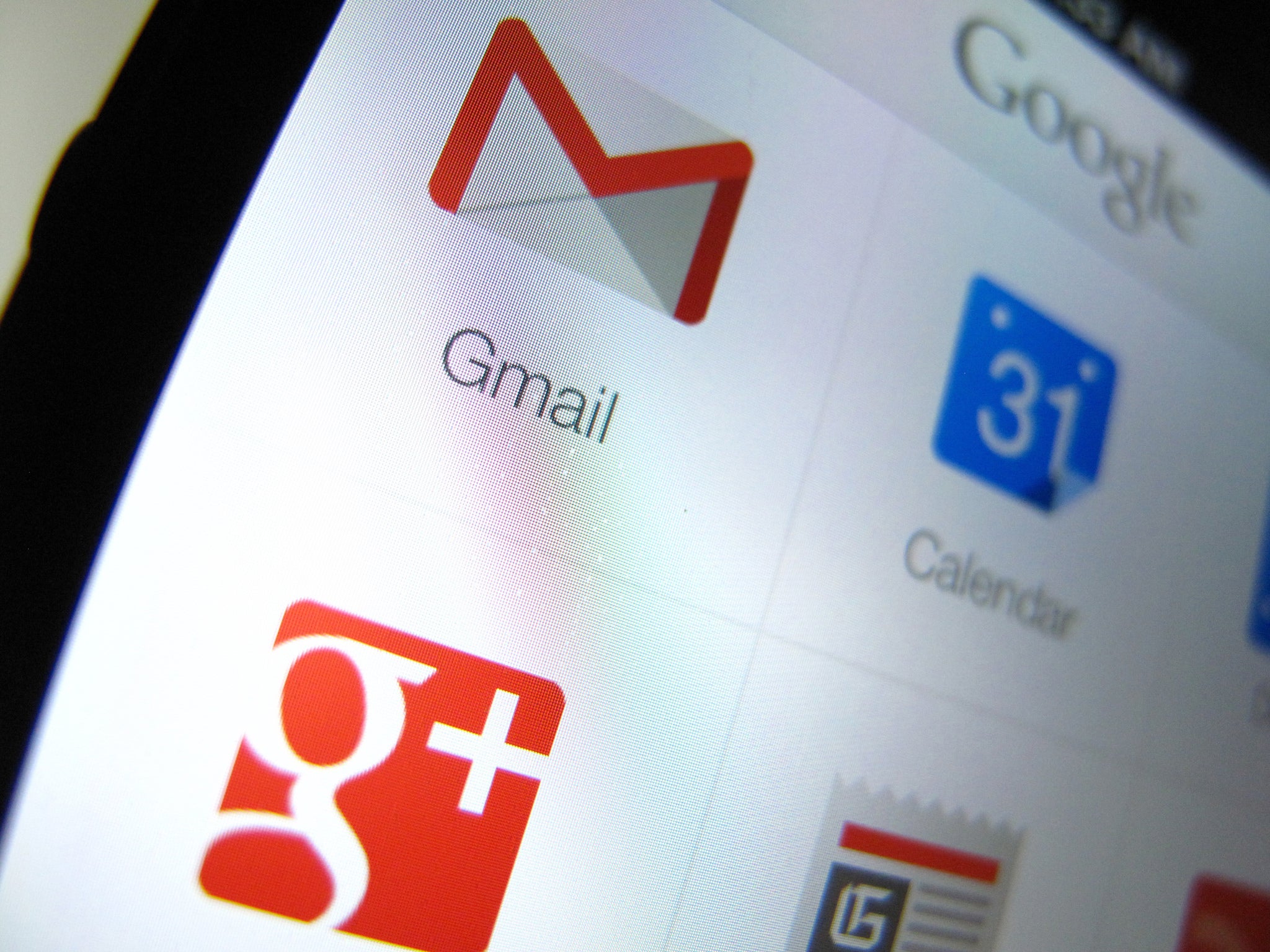 Google apps are shown on an Apple iphone 5 in this photo illustration in Encinitas, California, April 16, 2013.
