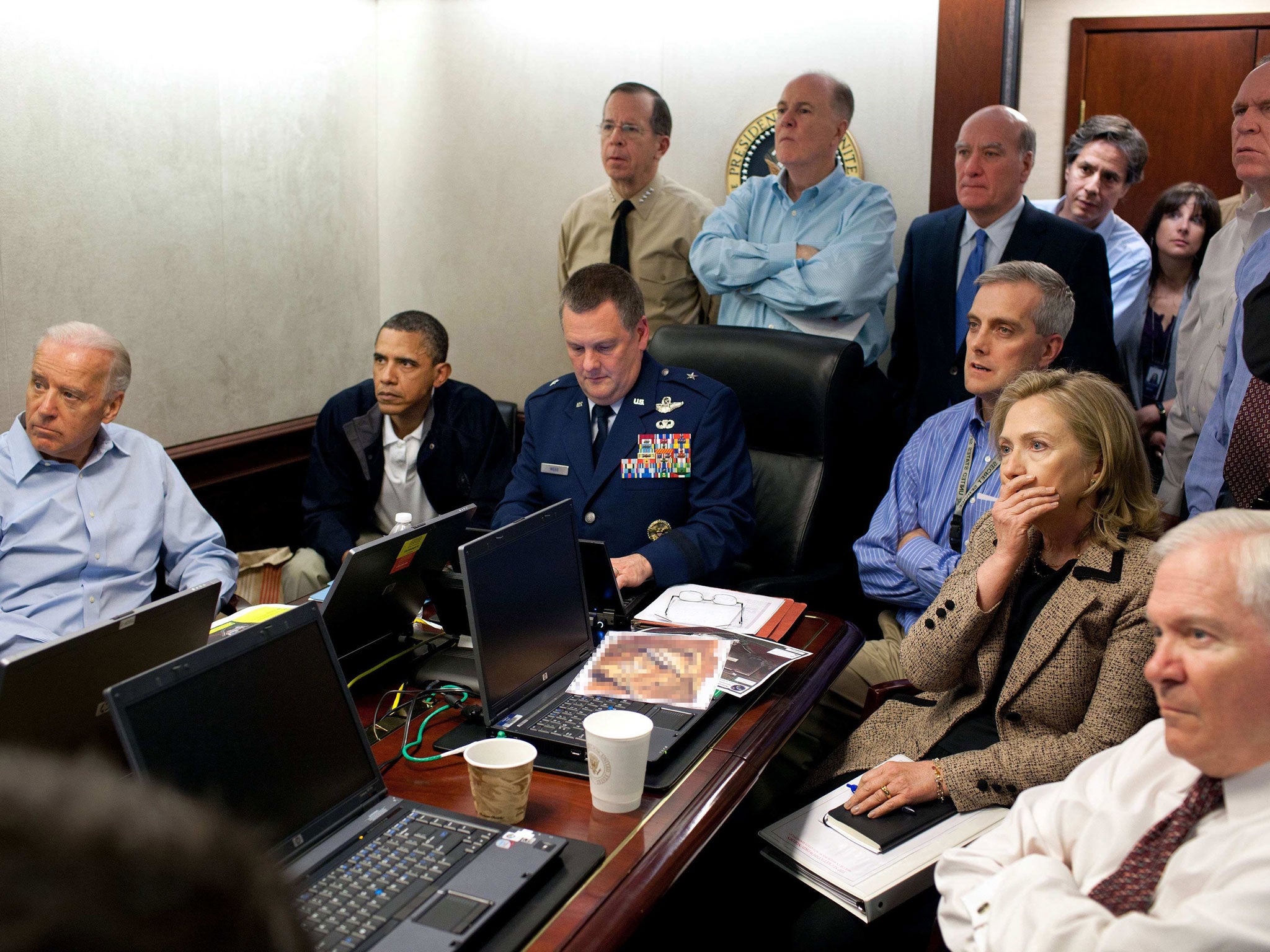 Barack Obama and Hillary Clinton watching the Navy SEALs operate inside bin Laden's compound from the White House