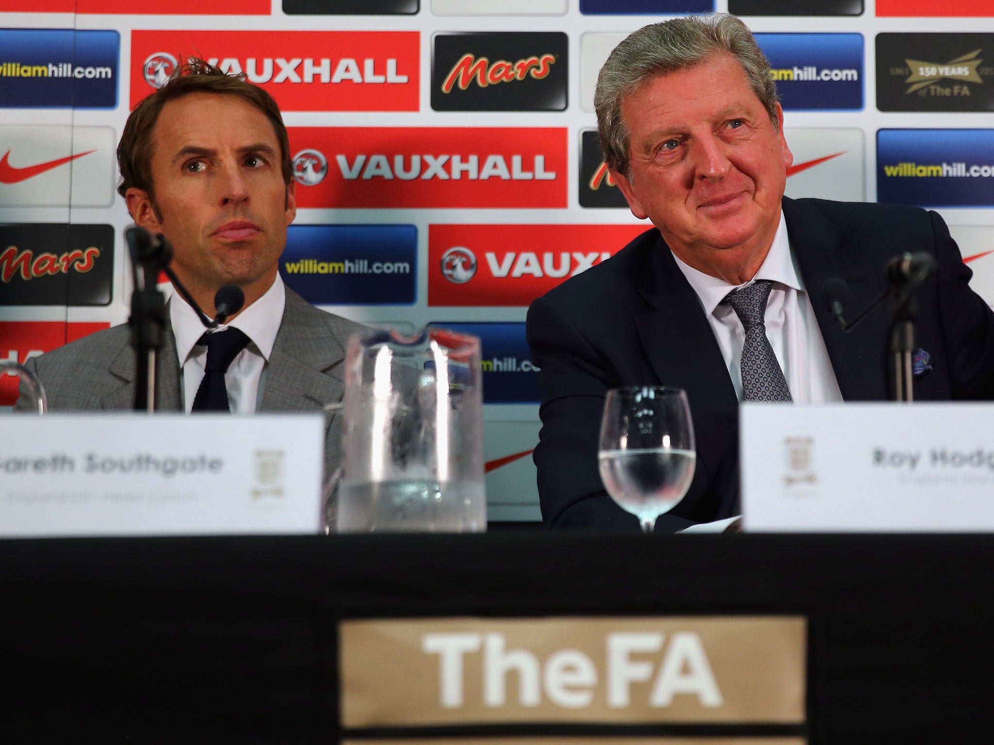 Gareth Southgate, left, admits he faces a real challenge in his new role