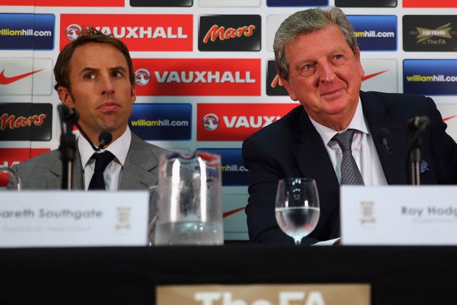Gareth Southgate, left, admits he faces a real challenge in his new role
