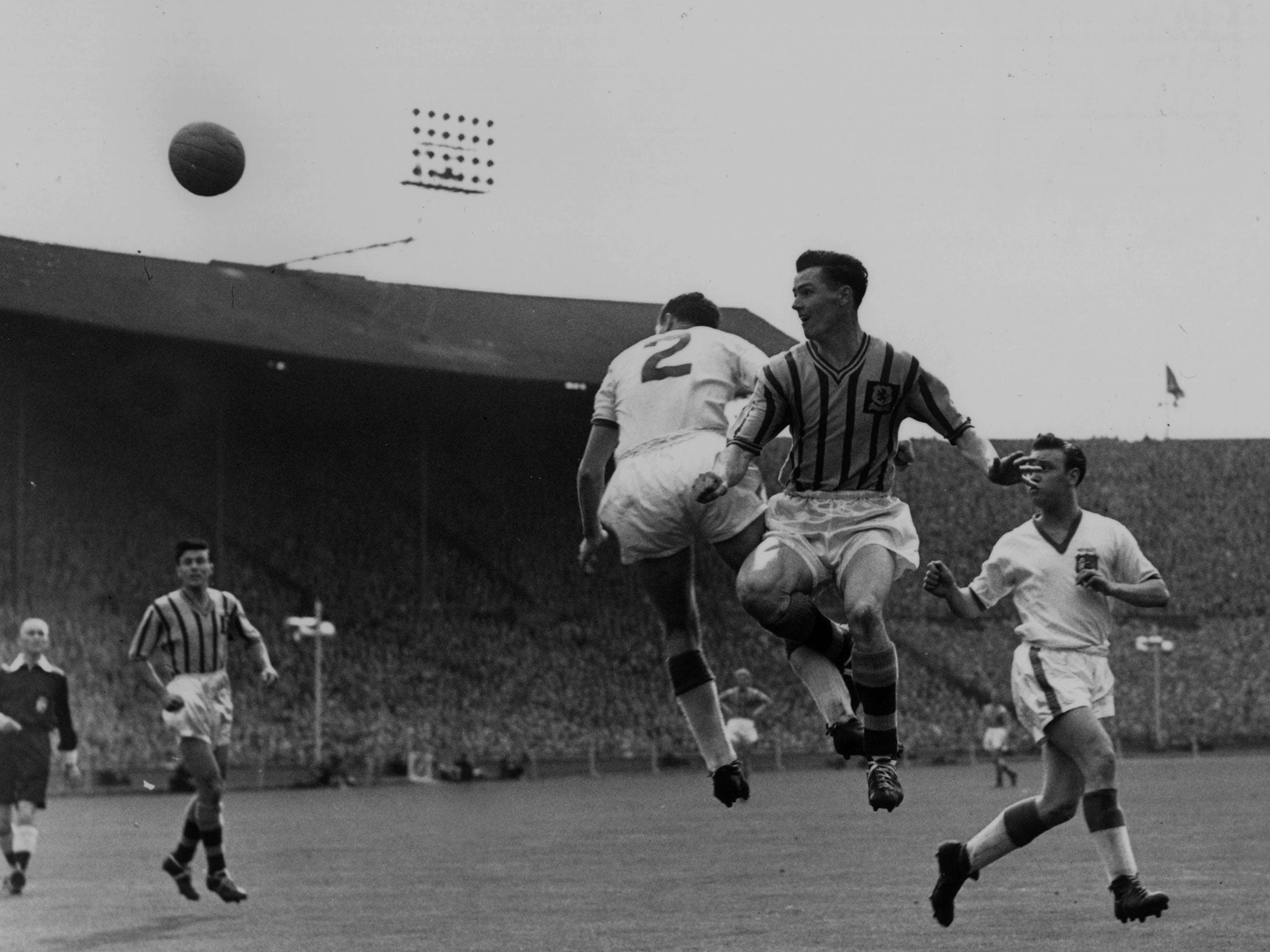 Peter McParland, pictured here in a game in 1957, scored the winning goal for Villa in the final