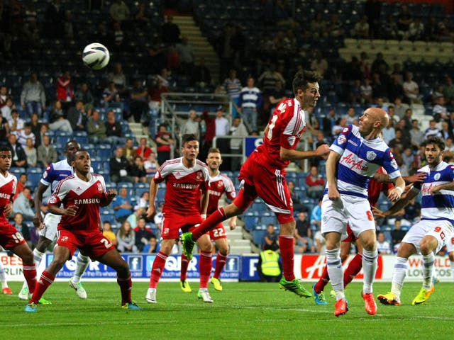 QPR's Andrew Johnson heads at the goal