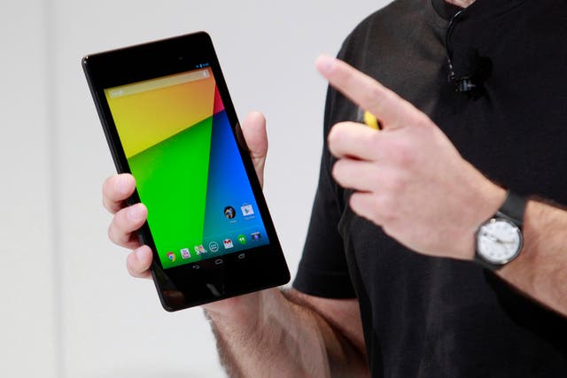 Hugo Barra, director of Product Management at Android, holds the new Nexus 7 tablet during a Google event at Dogpatch Studio in San Francisco, California.